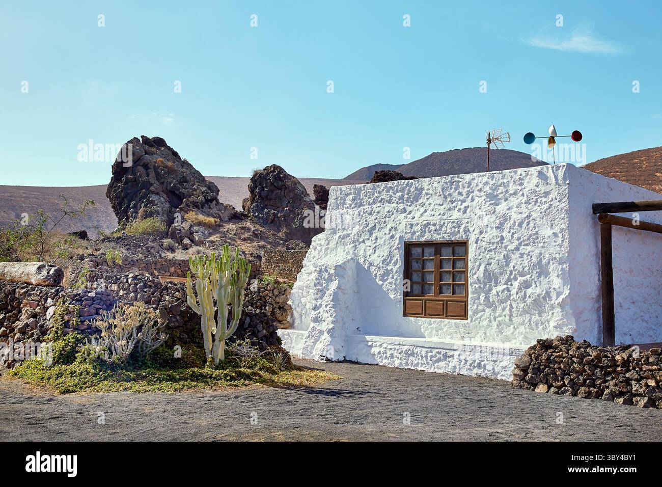 Beautiful Landscape of Lanzarote Island with small white hause, Canaries, Spain Stock Photo