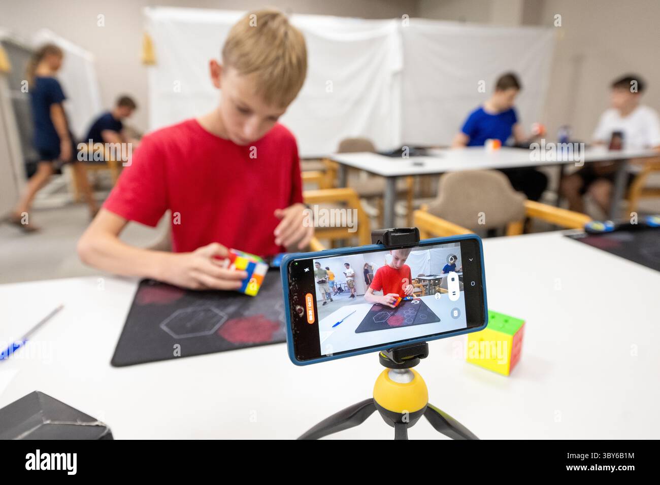 Rubik's Cube competition with one hand was held at 36th International ...