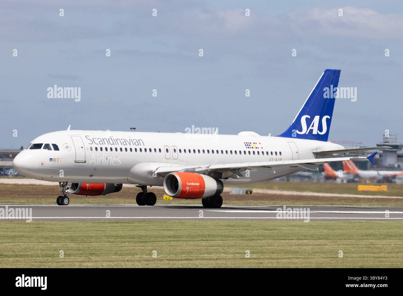An SAS, Scandinavian Airline System, Airbus A320, OY-KAP, at Manchester Airport. Stock Photo