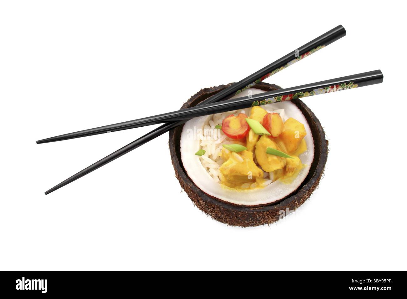 Coconut, rice and curry chicken on white background, close up Stock Photo