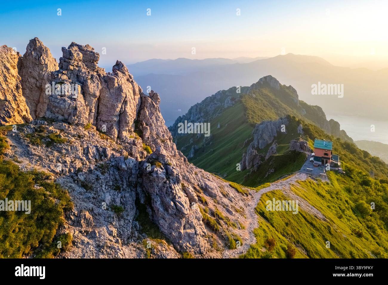 Aerial view of the Rifugio Rosalba and Grignetta in summer at sunset. Piani Resinelli, Lecco, Lombardy, Italy. Stock Photo