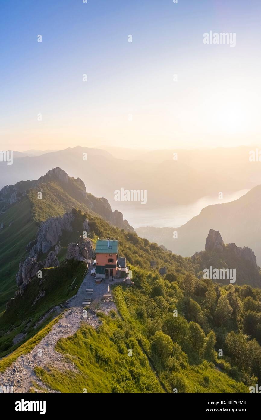 Aerial view of the Rifugio Rosalba and Grignetta in summer at sunset. Piani Resinelli, Lecco, Lombardy, Italy. Stock Photo