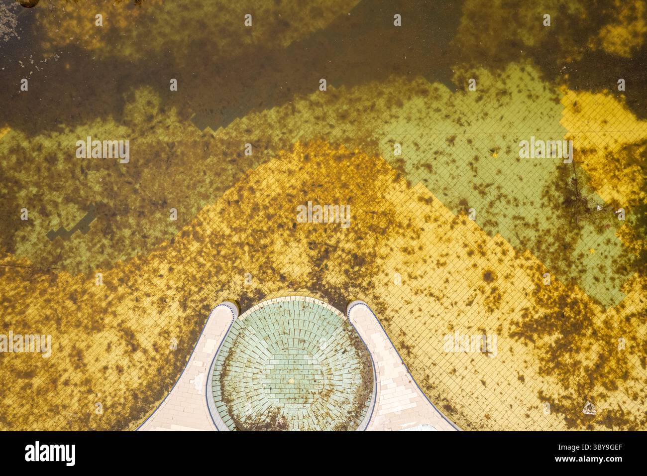 Top Down Drone Shot of a Ruined Swimming Pool Stock Photo - Alamy