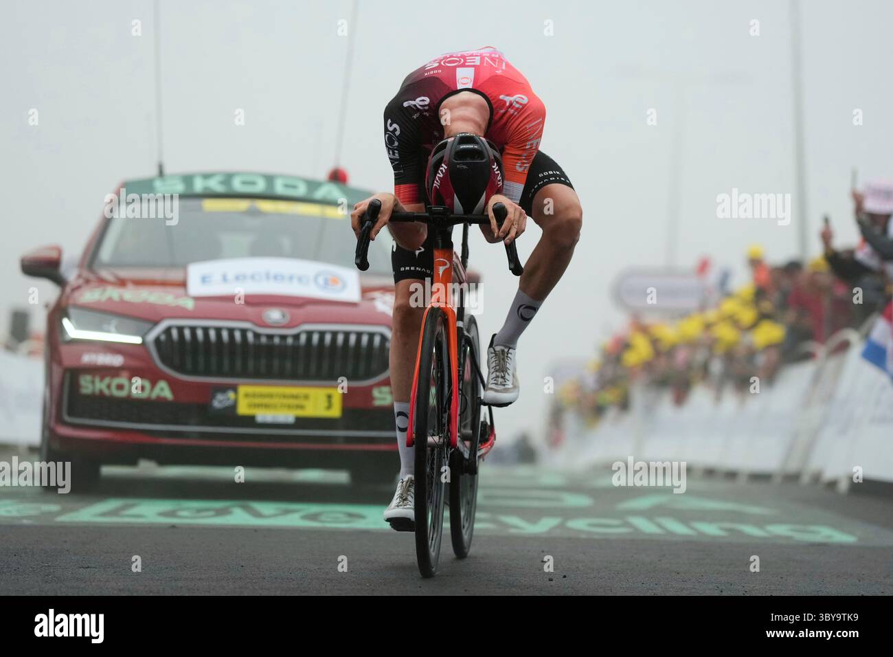Stage winner Netherlands' Thymen Arensman celebrates when crossing the ...