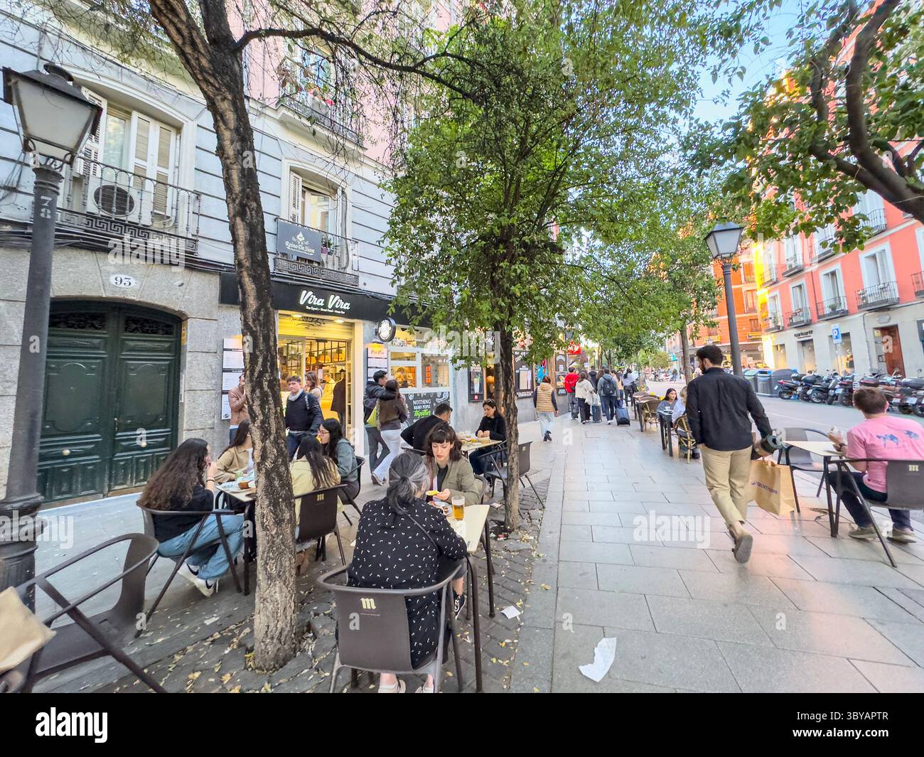 Plazuela de Antonio Vega, triangular square formed by the meeting point of Corredera Alta de San Pablo, Velarde, and Fuencarral streets, Madrid, Spain - Smartphone Captured Stock Image
