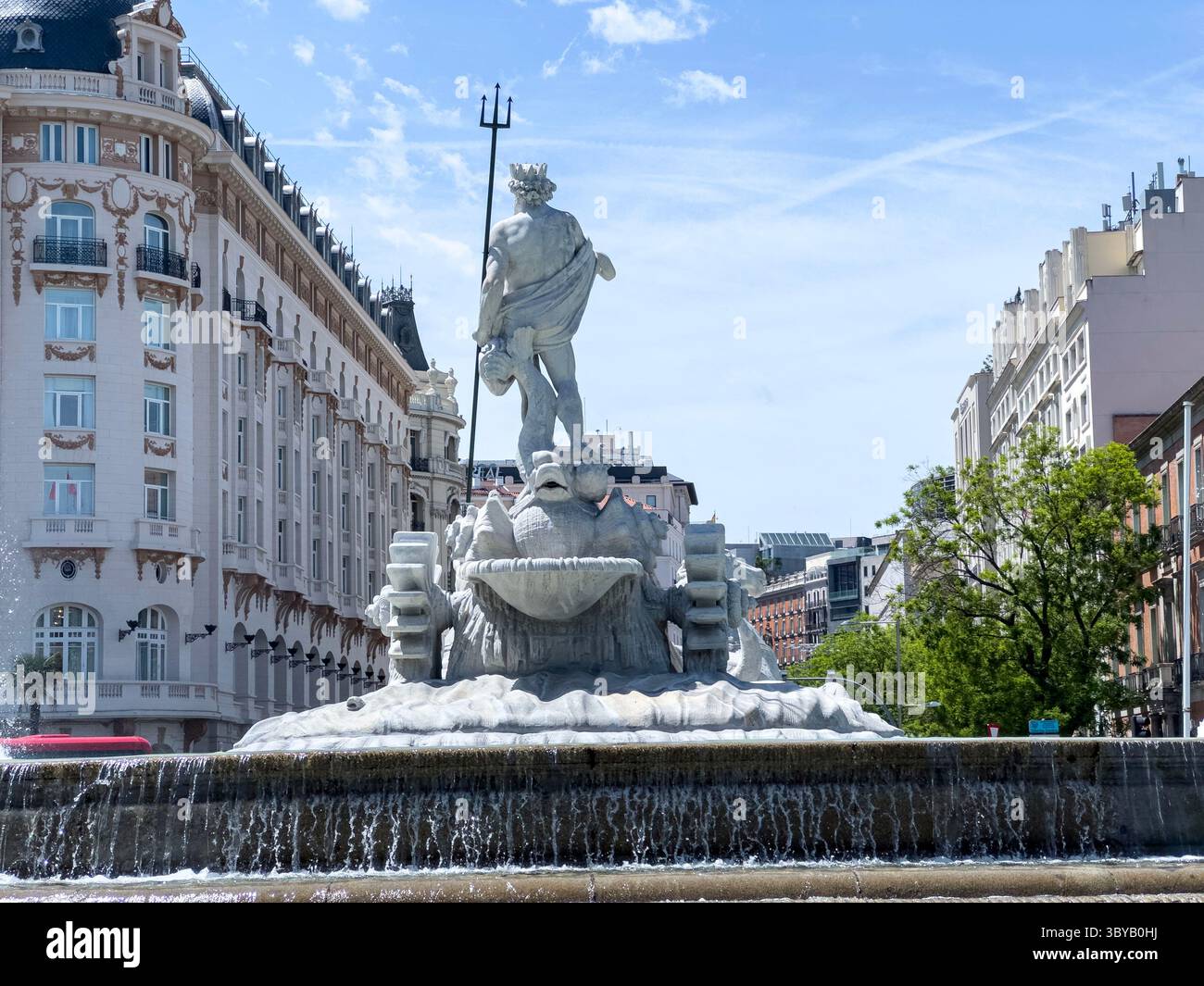 Fuente de Neptuno in Plaza de Cánovas del Castillo (commonly called Plaza de Neptuno), on Paseo del Prado, Madrid, Spain - Smartphone Captured Stock Image