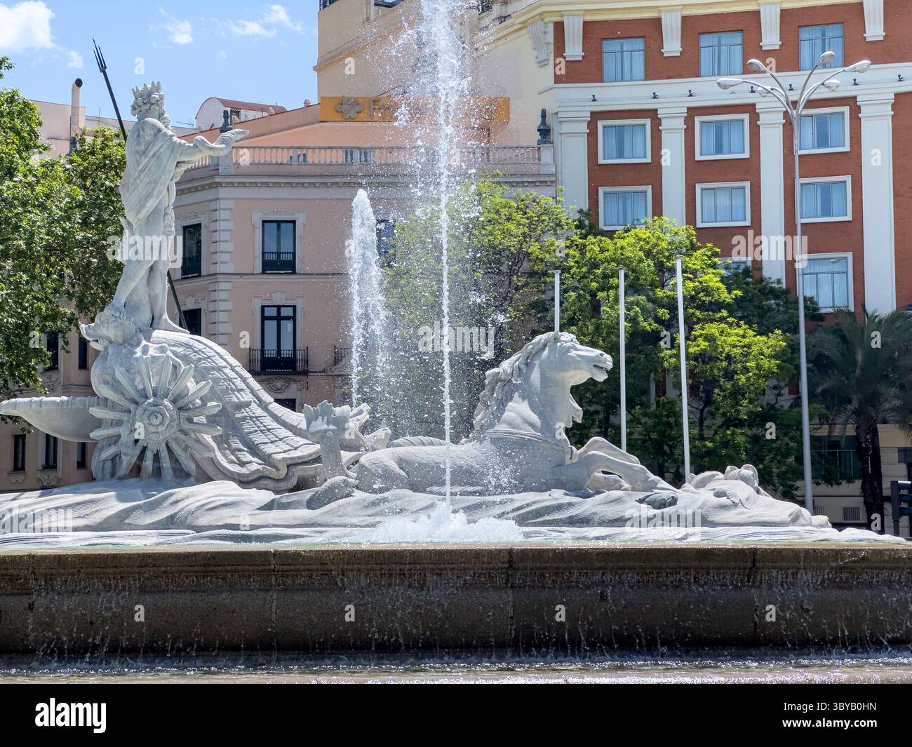 Fuente de Neptuno in Plaza de Cánovas del Castillo (commonly called Plaza de Neptuno), on Paseo del Prado, Madrid, Spain - Smartphone Captured Stock Image