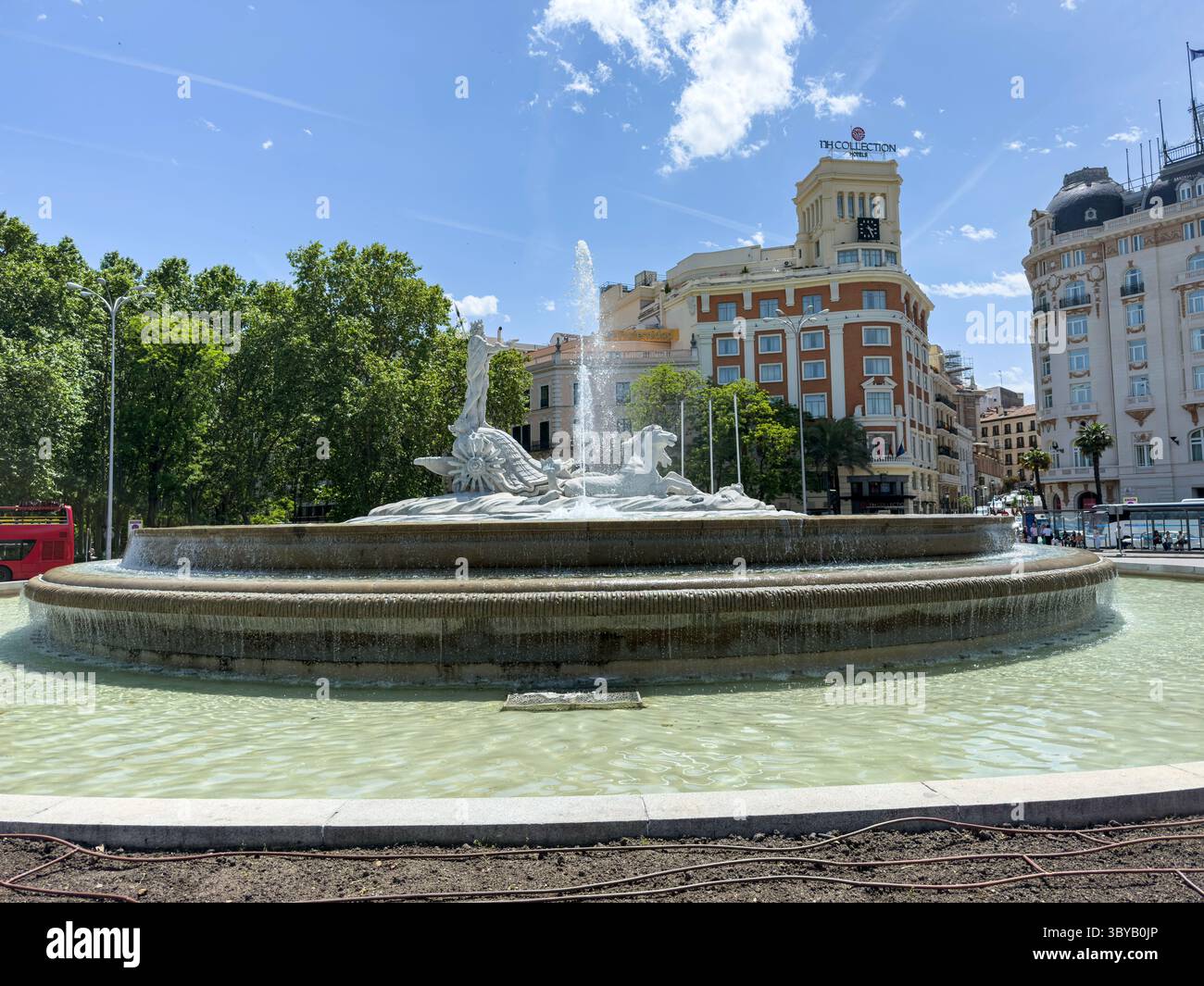Fuente de Neptuno in Plaza de Cánovas del Castillo (commonly called Plaza de Neptuno), on Paseo del Prado, Madrid, Spain - Smartphone Captured Stock Image