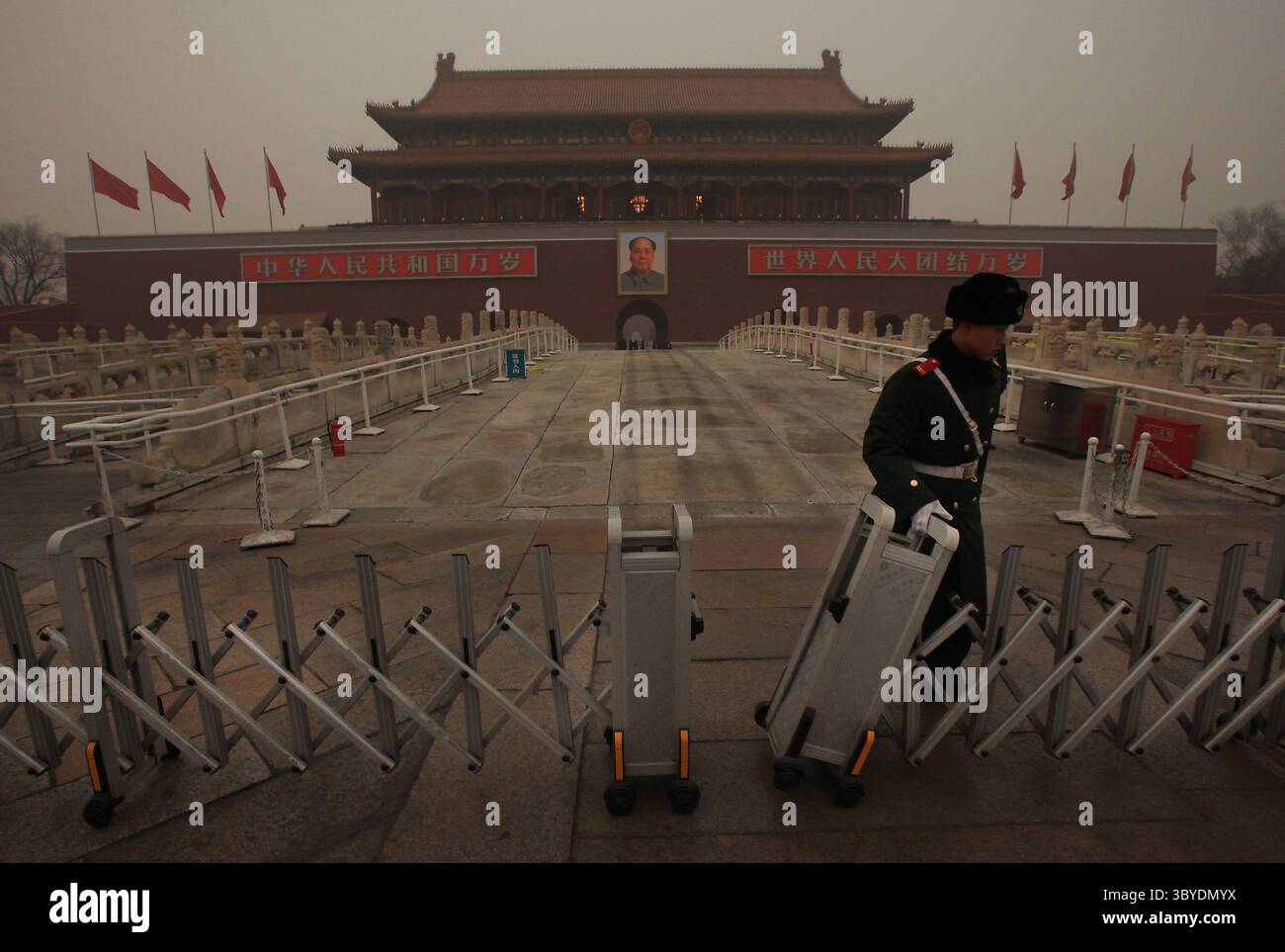 January 18, 2012, BEIJING, CHINA: Tiananmen Square sits under a thick blanket of smog, which the U.S. Embassy's daily air index has rated as hazardous, darkening the afternoon sun in Beijing January 18, 2012.  Air pollution in China's capital has been so bad that the air quality monitoring system used by the U.S. Embassy here has described the pollution as being off the scale. The World Bank reports that 16 of the 20 most polluted cities in the world are in China, with Beijing being the 10th most polluted capital. (Credit Image: © Stephen Shaver/ZUMA Press Wire) Stock Photo