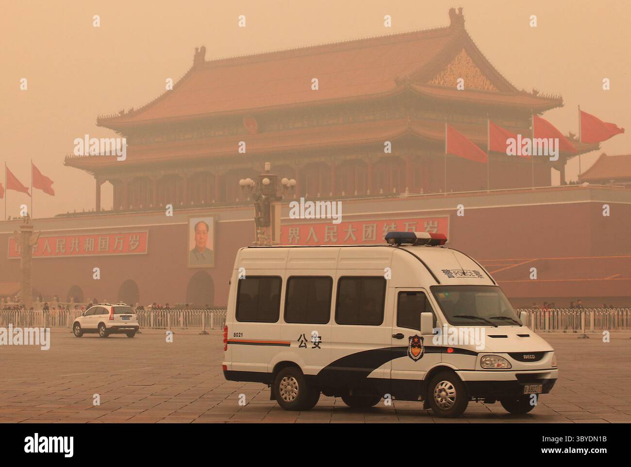 January 18, 2012, BEIJING, CHINA: Tiananmen Square sits under a thick blanket of smog, which the U.S. Embassy's daily air index has rated as hazardous, darkening the afternoon sun in Beijing January 18, 2012.  Air pollution in China's capital has been so bad that the air quality monitoring system used by the U.S. Embassy here has described the pollution as being off the scale. The World Bank reports that 16 of the 20 most polluted cities in the world are in China, with Beijing being the 10th most polluted capital. (Credit Image: © Stephen Shaver/ZUMA Press Wire) Stock Photo