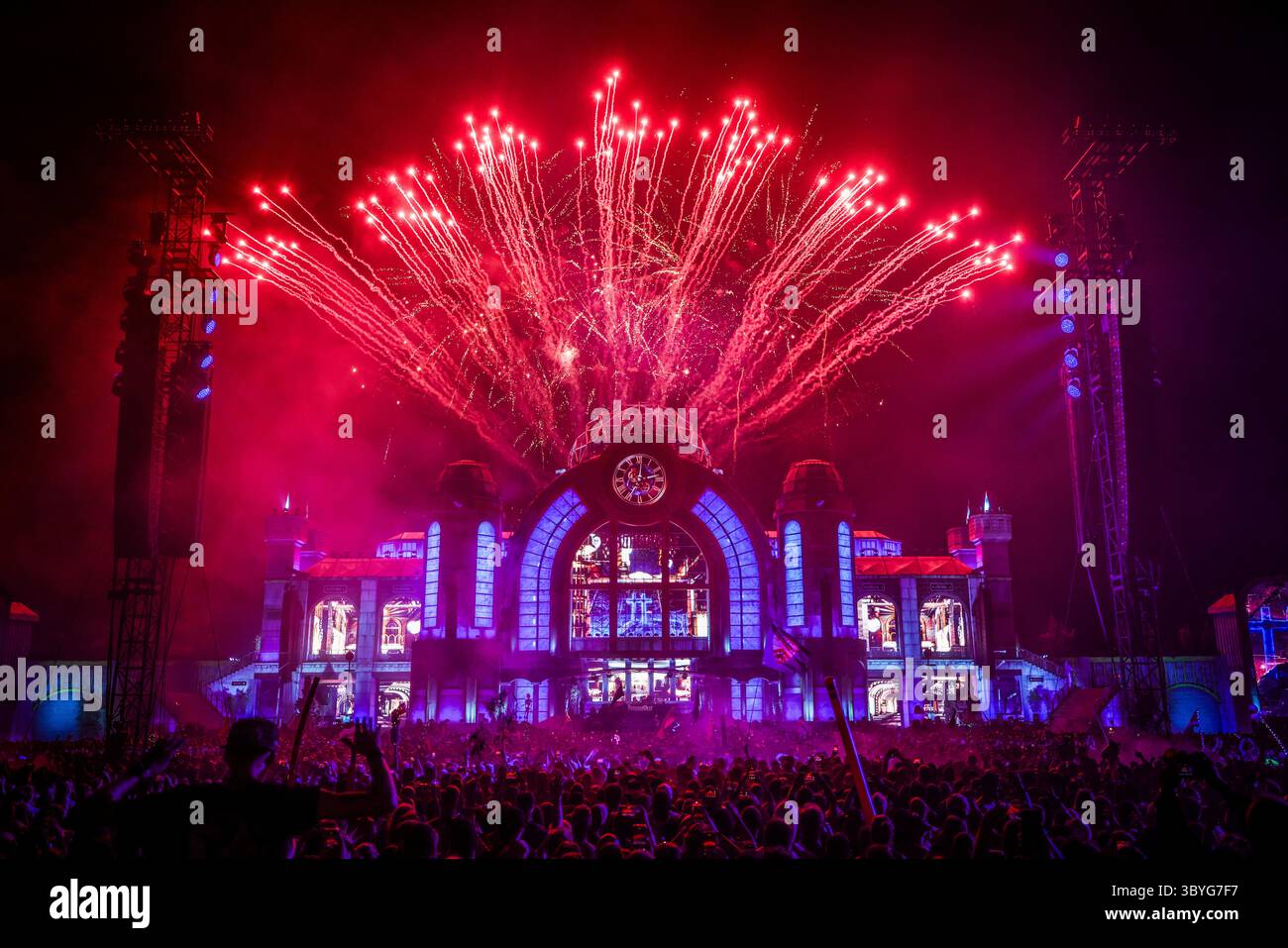 Fans dance as fireworks go off during DJ Timmy Trumpet's performance on ...