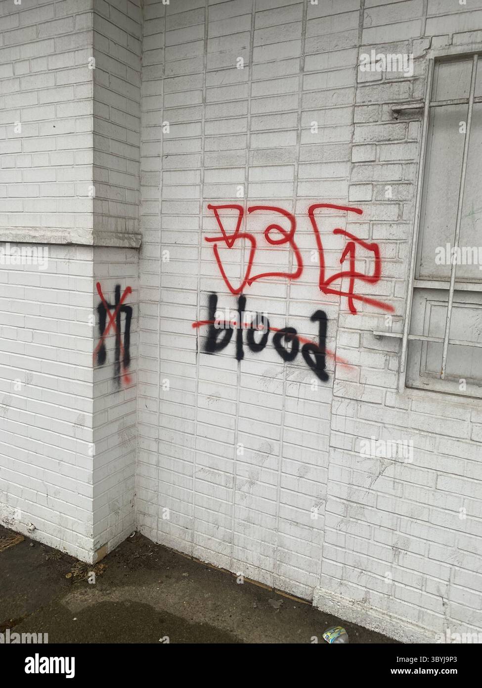 W7M ScoreGang graffiti. Crip set known for street-level disputes, petty crime, and extensive graffiti tagging in Detroit's Five Points neighborhood. - Smartphone Captured Stock Image