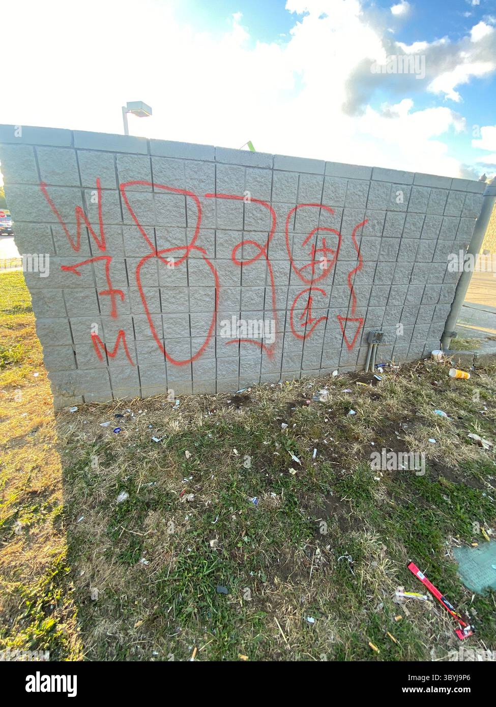 W7M ScoreGang graffiti. Crip set known for street-level disputes, petty crime, and extensive graffiti tagging in Detroit's Five Points neighborhood. - Smartphone Captured Stock Image