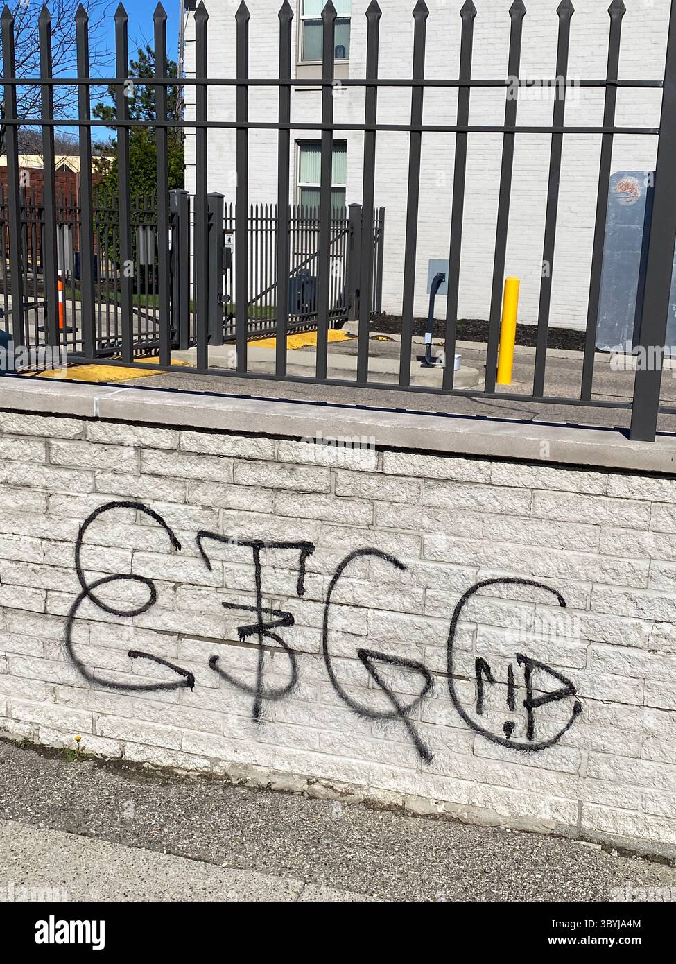 W7M ScoreGang graffiti. Crip set known for street-level disputes, petty crime, and extensive graffiti tagging in Detroit's Five Points neighborhood. - Smartphone Captured Stock Image