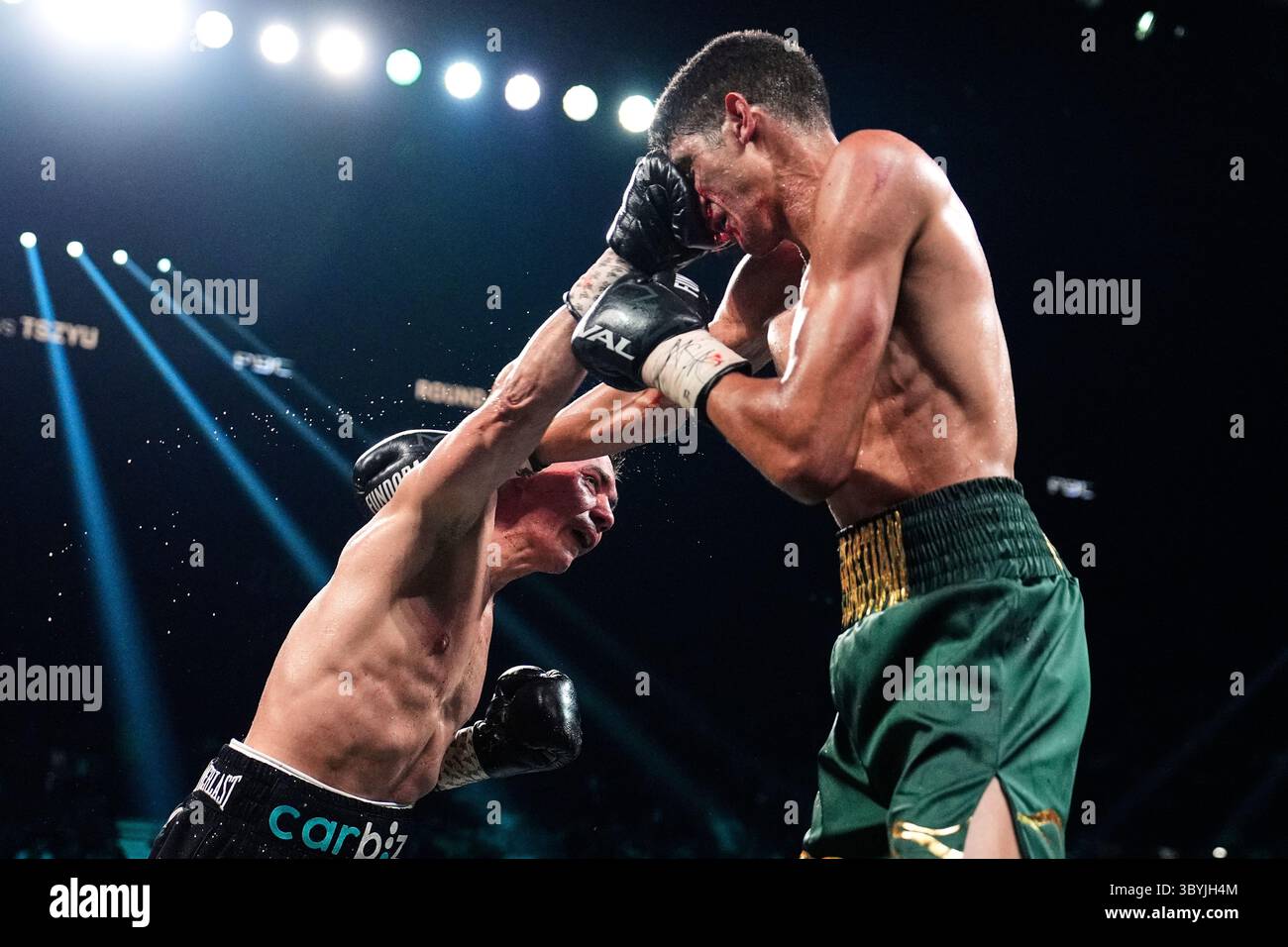 Tim Tszyu, left, fights Sebastian Fundora in a super welterweight title ...