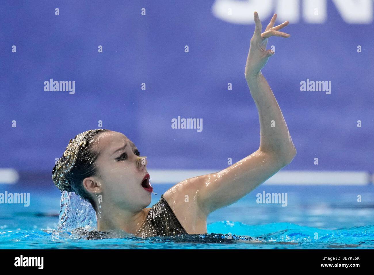 Xu Huiyan of China competes in the women's solo free preliminary of ...