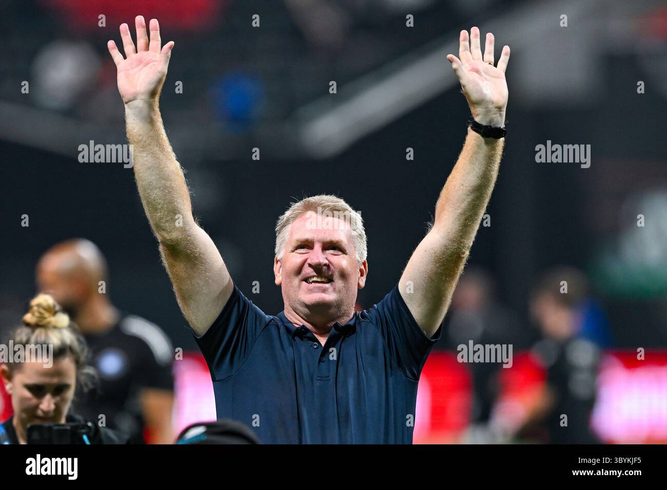ATLANTA, GA – JULY 19: Charlotte head coach Dean Smith acknowledges the ...