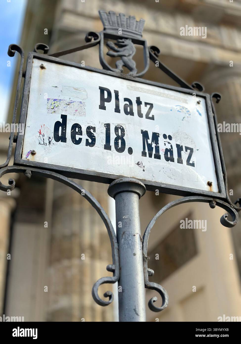 Monumental Berlin Signage at Brandenburg Gate – 'Platz des 18. März' Celebrating Freedom and Democracy - Smartphone Captured Stock Image