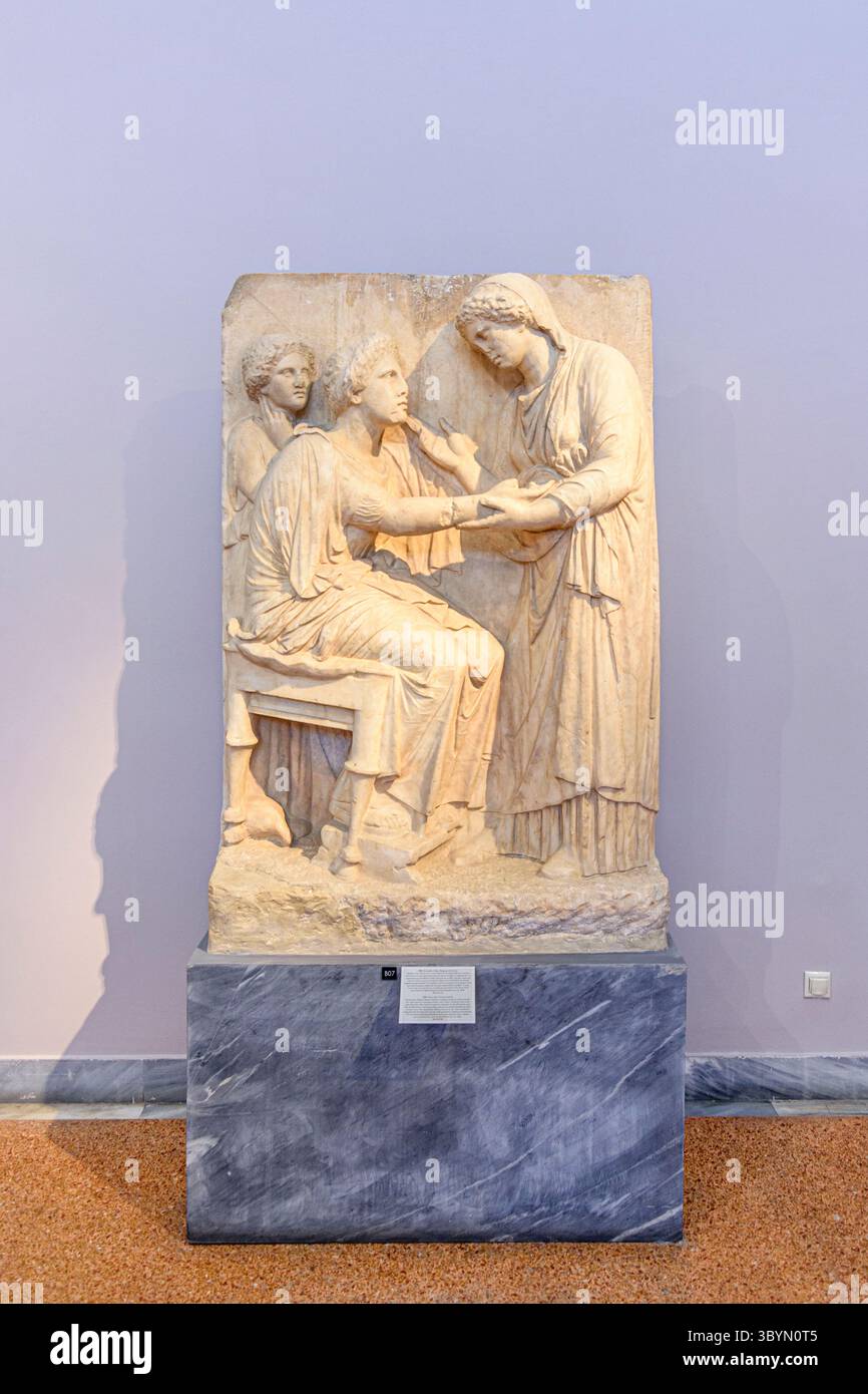 Grave stele a type of gravestone at the National Archaeological museum, Athens, Greece Stock Photo