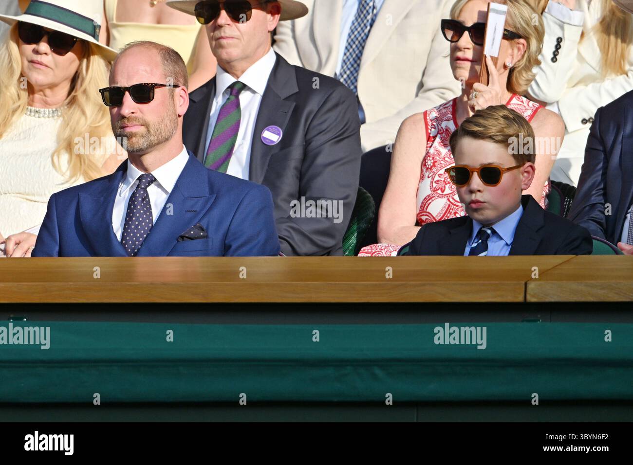 LONDON, UNITED KINGDOM - July 13: , HRH William, The Prince of Wales and HRH Prince George attend the men’s singles tennis finals on centre court  during day fourteen of the 2025 Wimbledon Championships at The All England Lawn Tennis and Croquet Club in Wimbledon on July 13, 2025, in London, United Kingdom Stock Photo