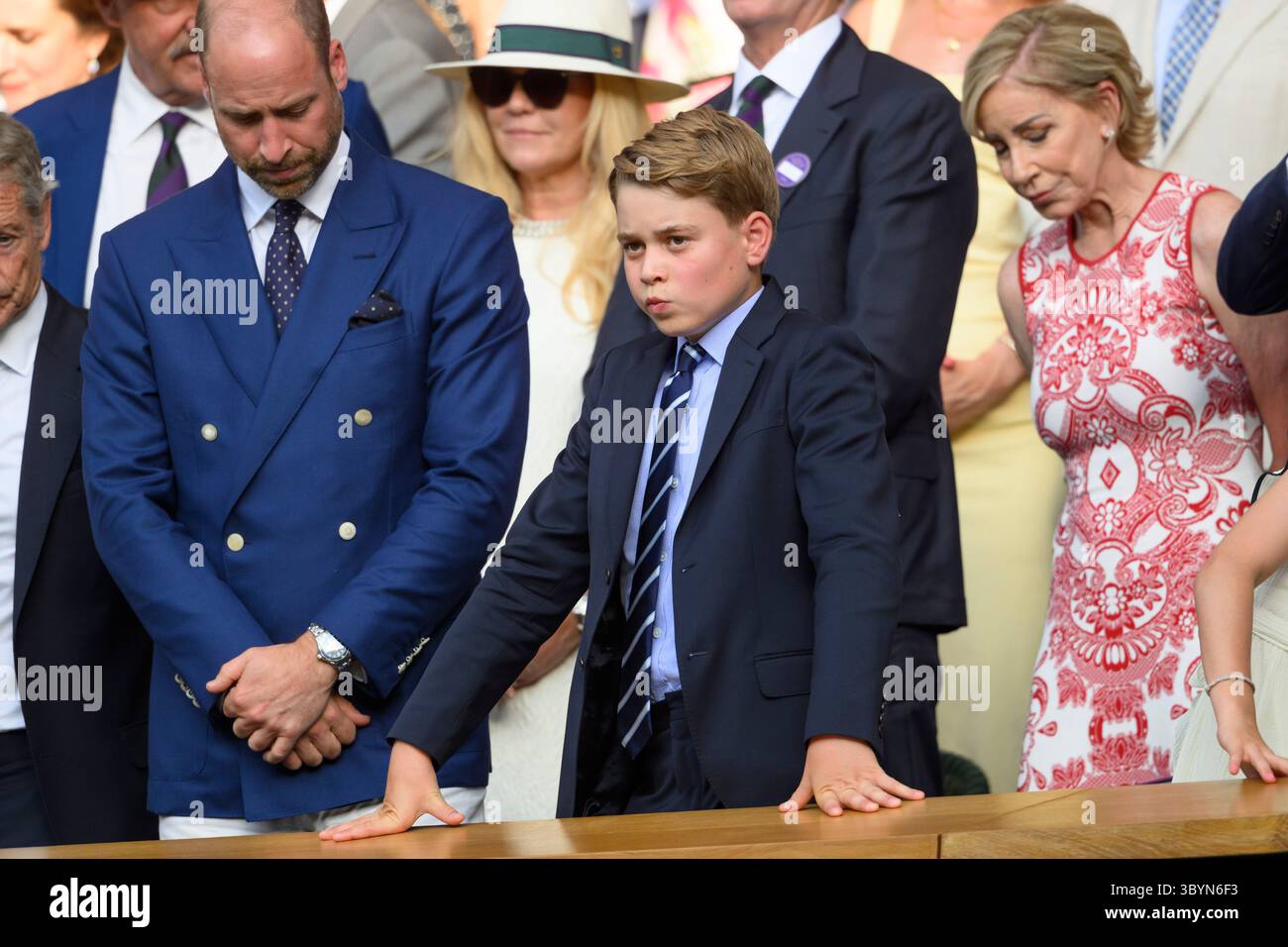LONDON, UNITED KINGDOM - July 13: , HRH William, The Prince of Wales and HRH Prince George attend the men’s singles tennis finals on centre court  during day fourteen of the 2025 Wimbledon Championships at The All England Lawn Tennis and Croquet Club in Wimbledon on July 13, 2025, in London, United Kingdom Stock Photo