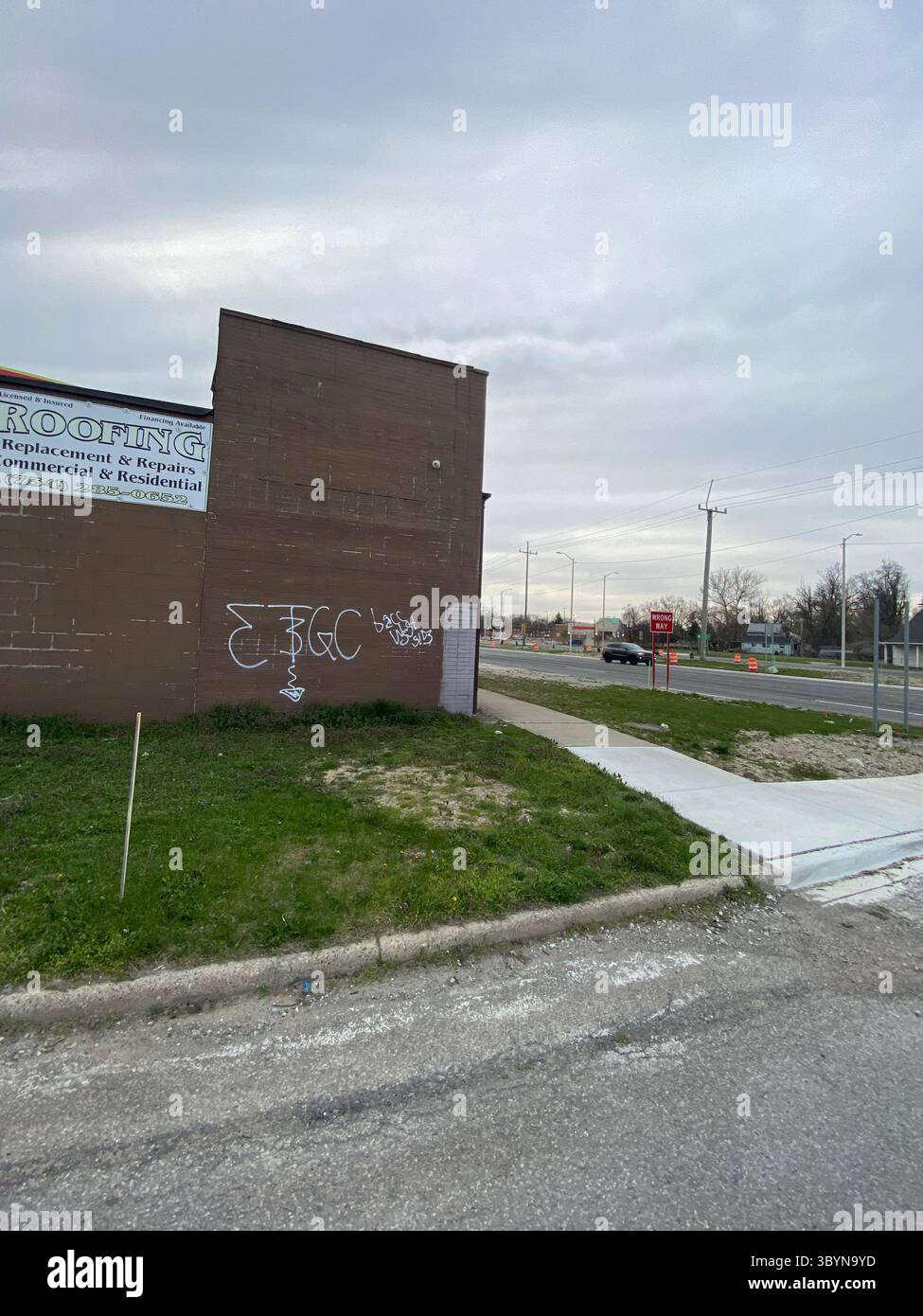 ScoreGang, Detroit Crips subset, ‘GANGSTA’ graffiti tag in blue paint, Five Points Detroit, ‘Gangsta’ denotes Crips descriptor. - Smartphone Captured Stock Image