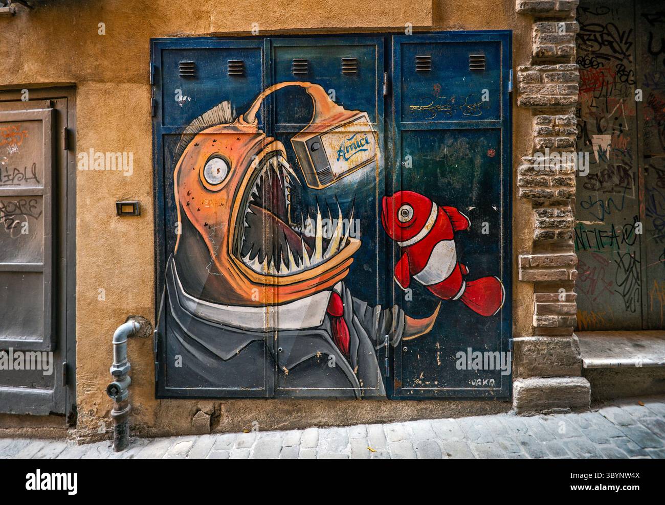Frightening mural in passage off Piazza Roma in center of the city of Ancona, region of le Marche, Italy Stock Photo