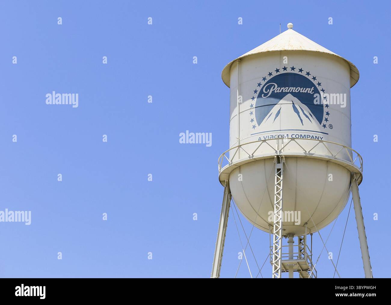 The famous water tower of the Paramount studios in front of a clear blue sky. The logo of Paramount Pictures is painted on the water tower, Los Angele Stock Photo