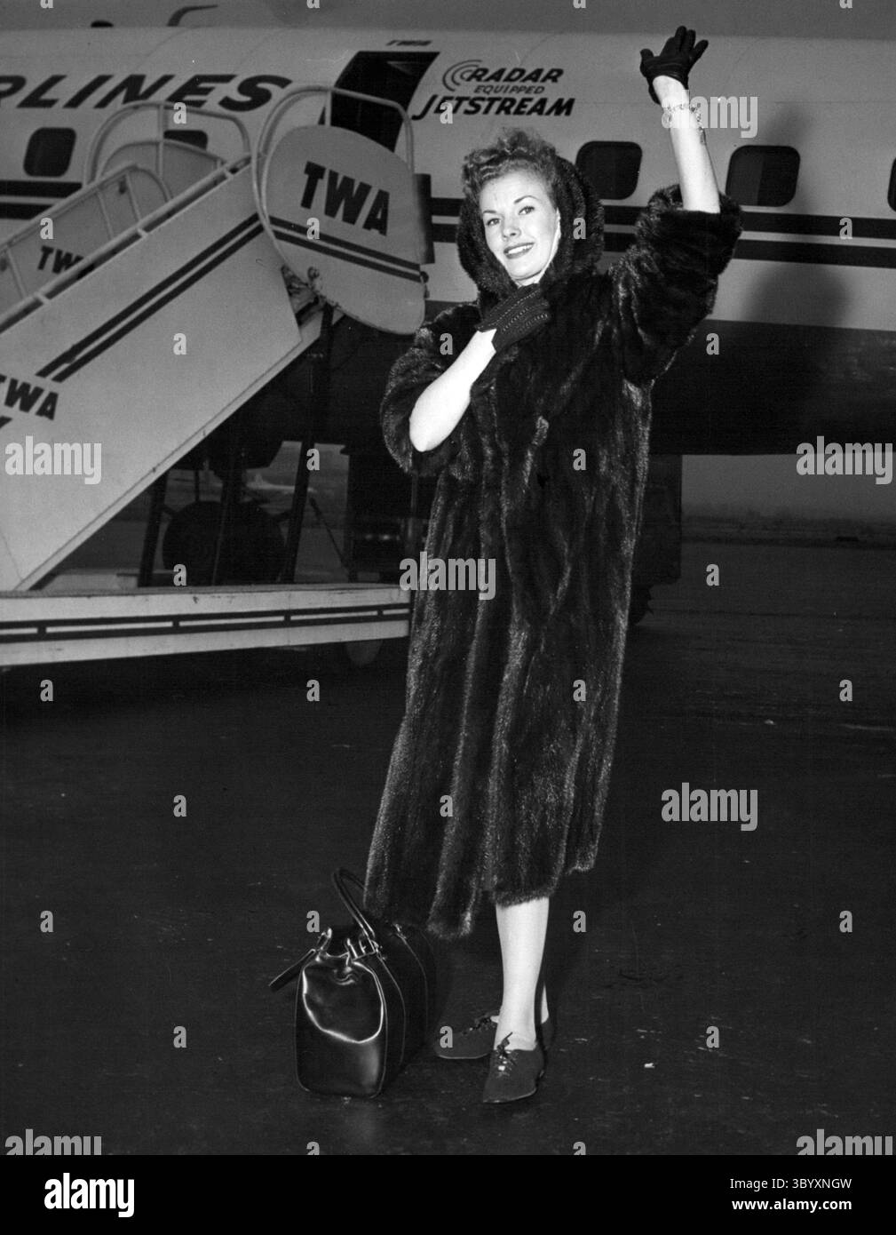 Dec. 14, 1968 - Idlewild Airport, New York - Mink-Clad GALE STORM, popular TV star and singer, is about to board a Twa Jetstream Flight to her home in Los Angeles following a one week stay in our city during which time she came down with the flu preventing her to make her expected Philadelphia engagement. She will resume her TV activities on the coast.  (Credit Image: © Keystone Press Agency/ZUMA Press Wire) Stock Photo