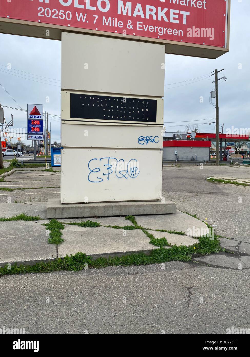 ScoreGang, "ETGC" tags seen on abandoned pylon sign in Five Points, a Detroit-based Crips subset, predominantly African American, assocd. w/ vandalism - Smartphone Captured Stock Image