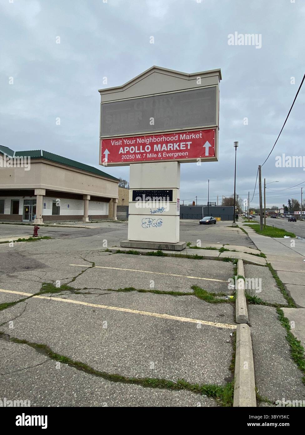 ScoreGang, "ETGC" tags seen on abandoned pylon sign in Five Points, a Detroit-based Crips subset, predominantly African American, assocd. w/ vandalism - Smartphone Captured Stock Image