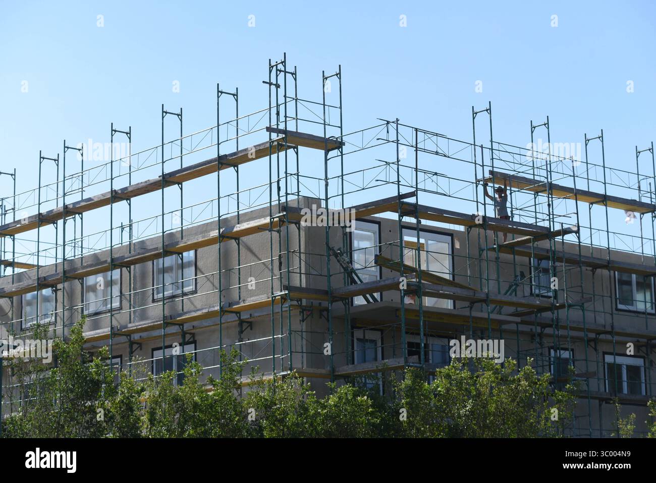 a scaffolding for the construction works on a building or house ...