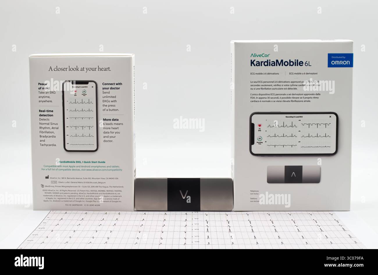 A close-up view of the alivecor kardiamobile 6L by Omron. Personal ekg device and its packaging, showcasing modern he Stock Photo