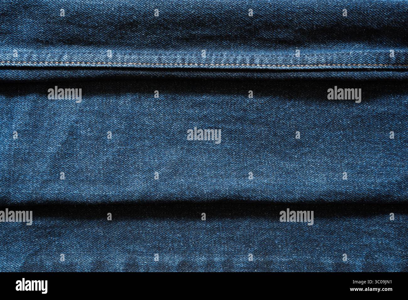 Blue Denim Texture with two Horizontal Folded Lines Stock Photo