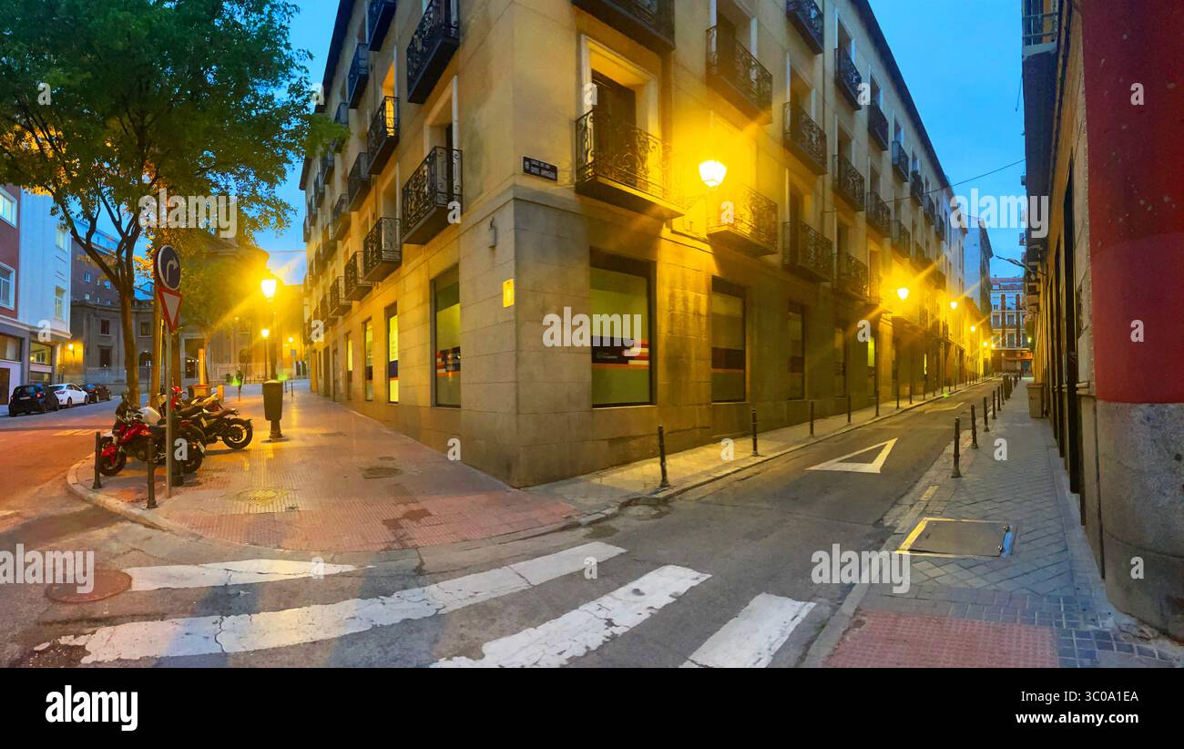 Los dos Amigos street corner to Maestro Guerrero street at dawn, panoramic view. Madrid, Spain. - Smartphone Captured Stock Image
