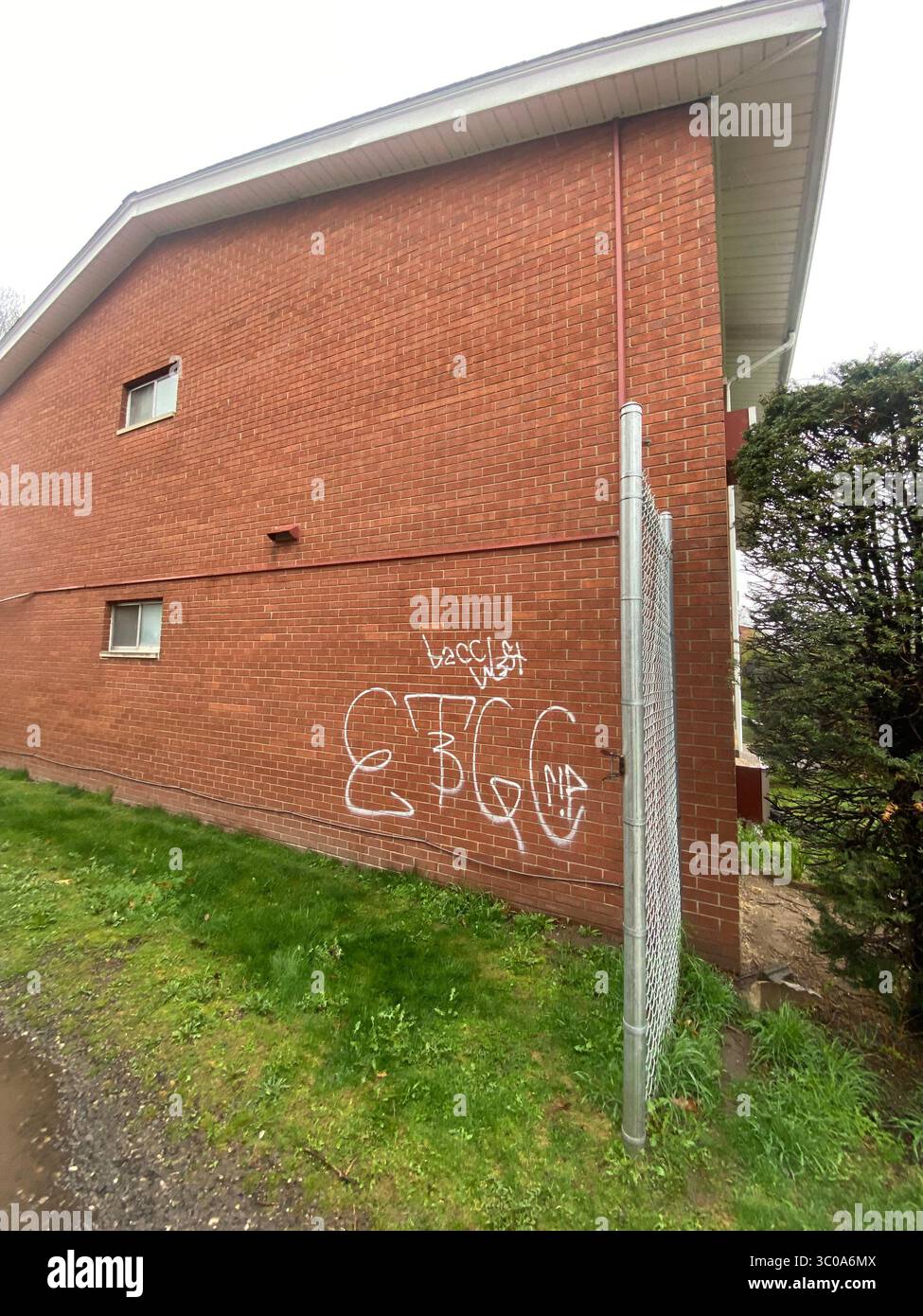 W7M ETGC (ScoreGang) gang graffiti in Detroit’s Five Points. Crip set representing an unofficial estimate of 1.5% of the local neighborhood population - Smartphone Captured Stock Image