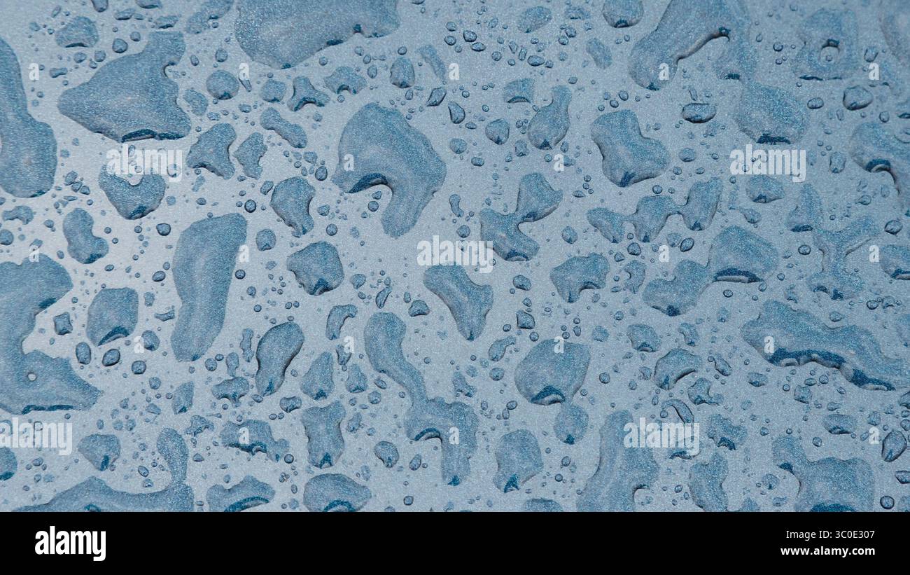 Raindrops on Blue Glitter Car Background Stock Photo