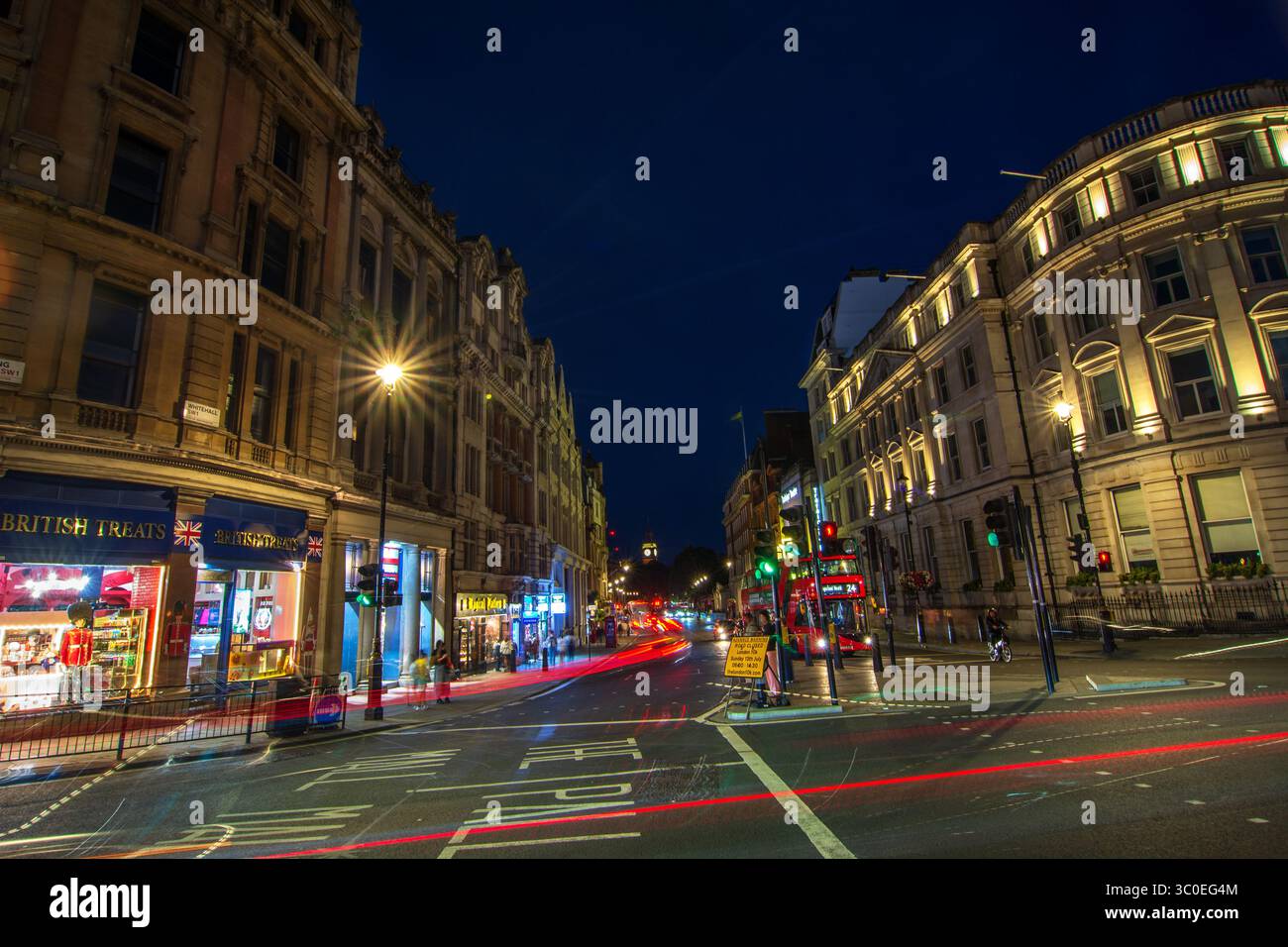 Looking down Whitehall towards Big Ben at night, London, England, UK. Stock Photo
