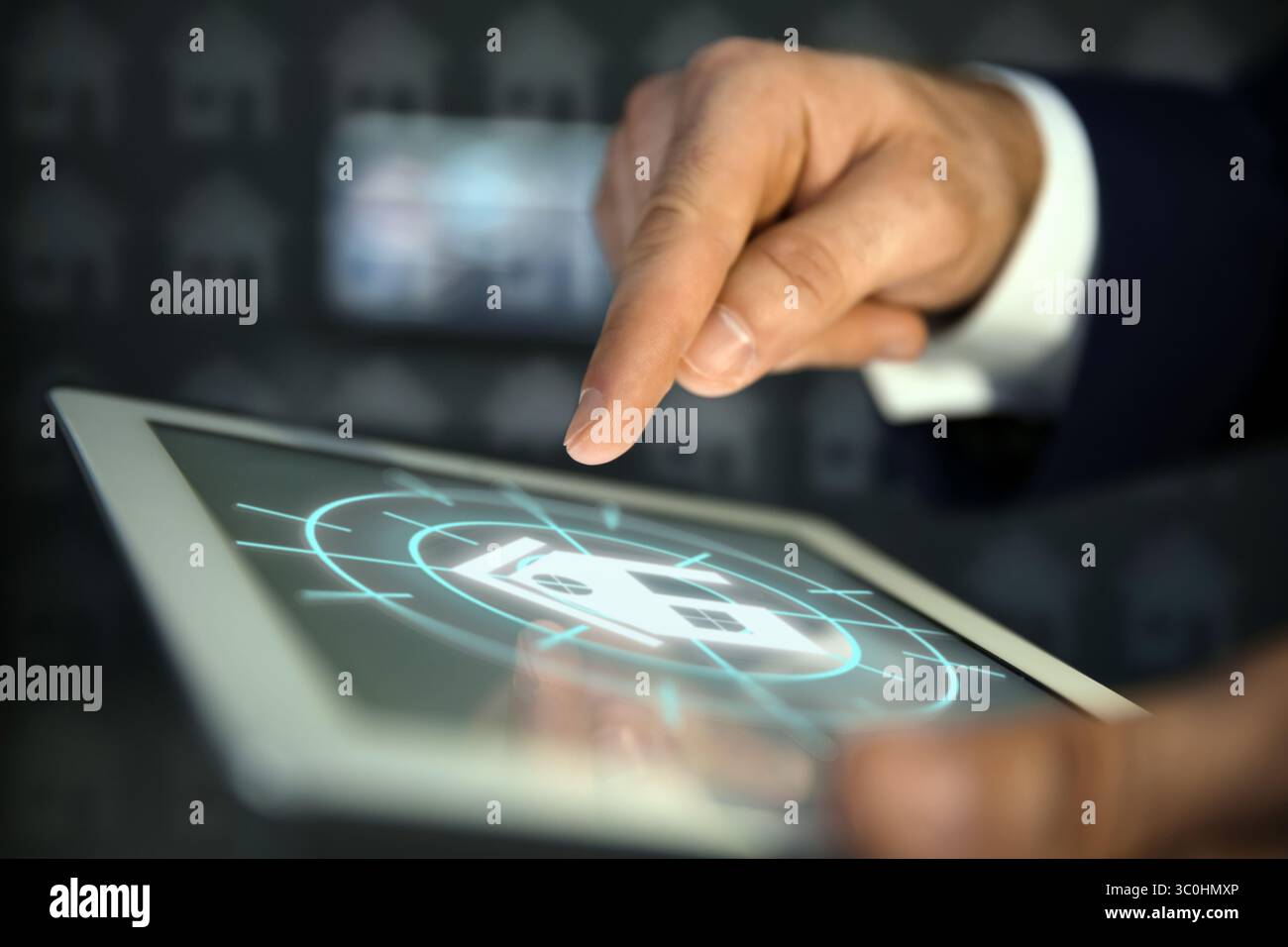 Real estate agent using tablet computer, closeup. House icon on device screen Stock Photo