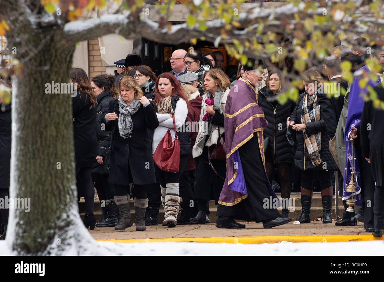 November 26, 2018 - Lansing, IL, USA - Mourners exit St. Archangel Michael Serbian Orthodox Church in Lansing, Ill., after the funeral service for Mercy Hospital shooting victim Dayna Less on Monday, Nov. 26, 2018. (Credit Image: © Kyle Telechan/Chicago Tribune/TNS via ZUMA Wire) Stock Photo