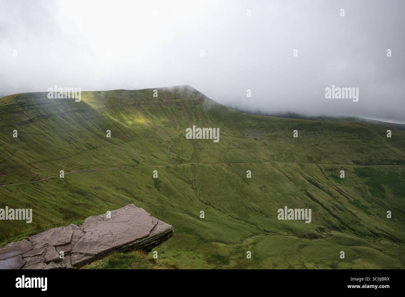 Green big mountain clouds hi res stock photography and images Alamy