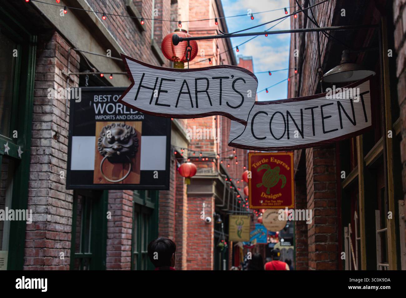Fan Tan Alley view featuring the store sign, red lanterns, and narrow ...