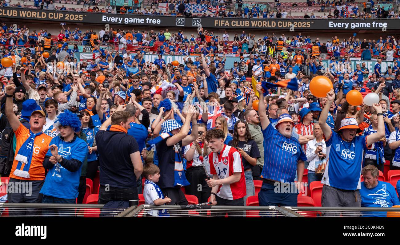 Oldham fans celebrate Stock Photo