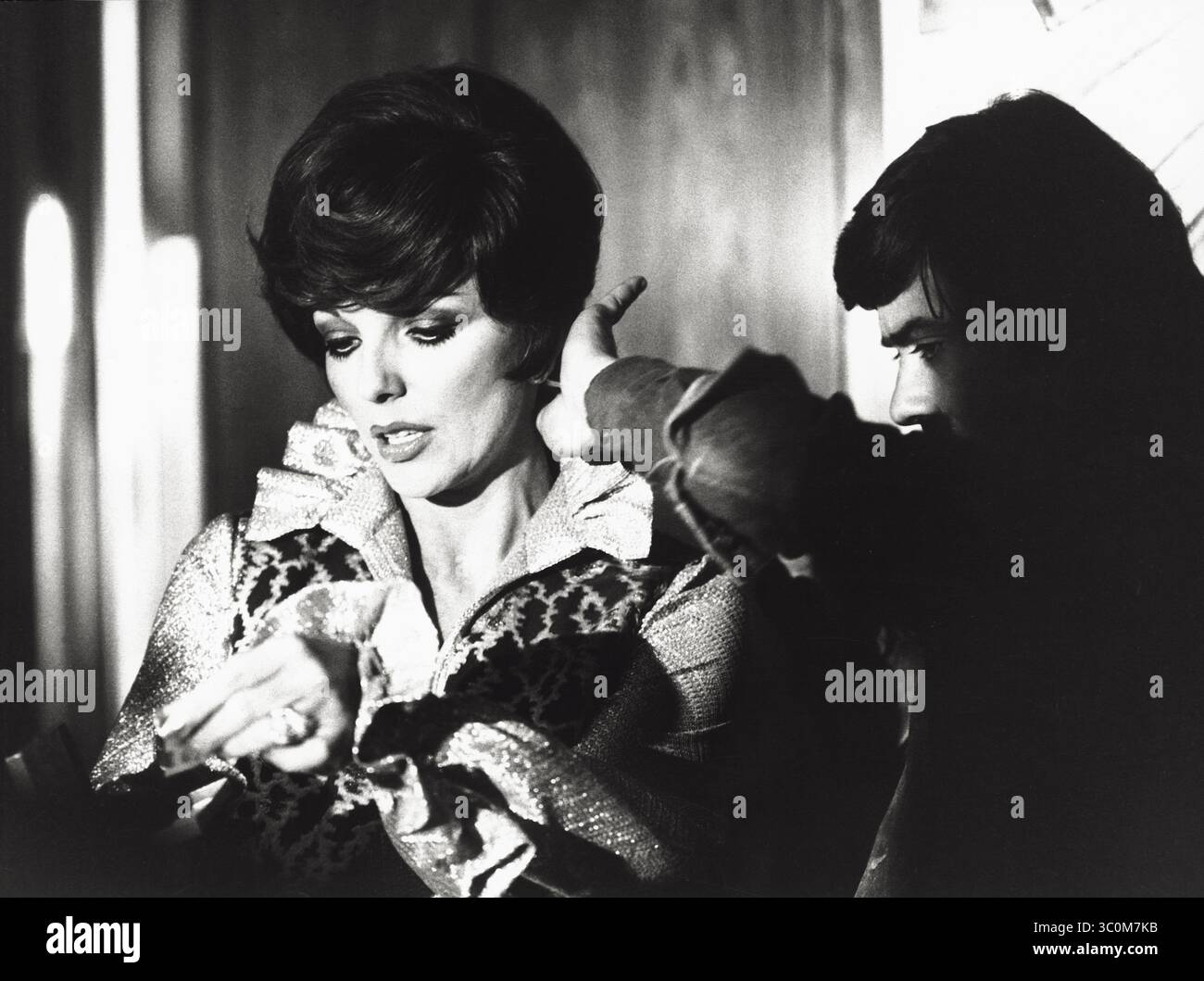 The actress Joan Collins in a scene from the film 'L'arbitro', directed