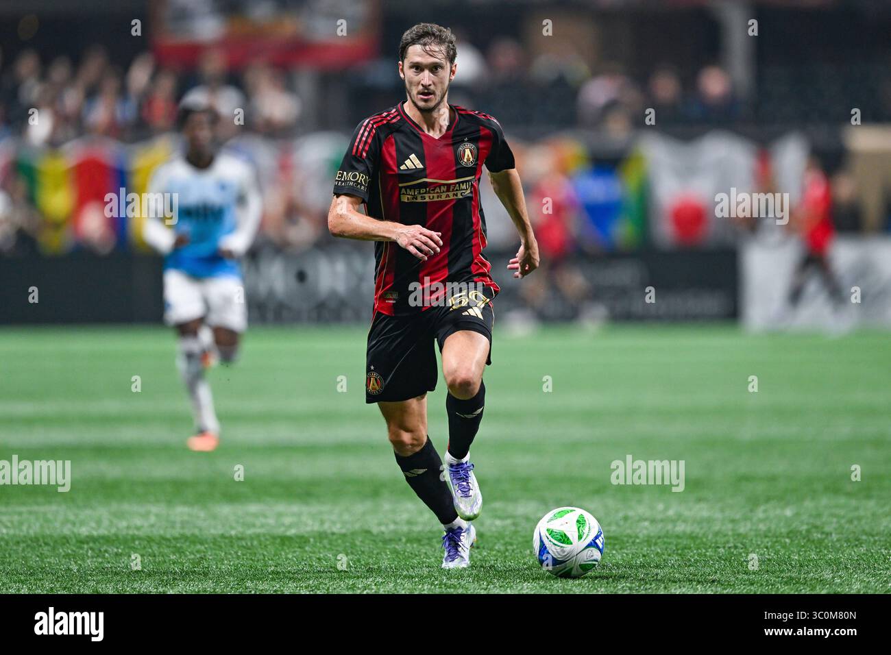 ATLANTA, GA – JULY 19: Aleksey Miranchuk #59 of Atlanta dribbles during ...