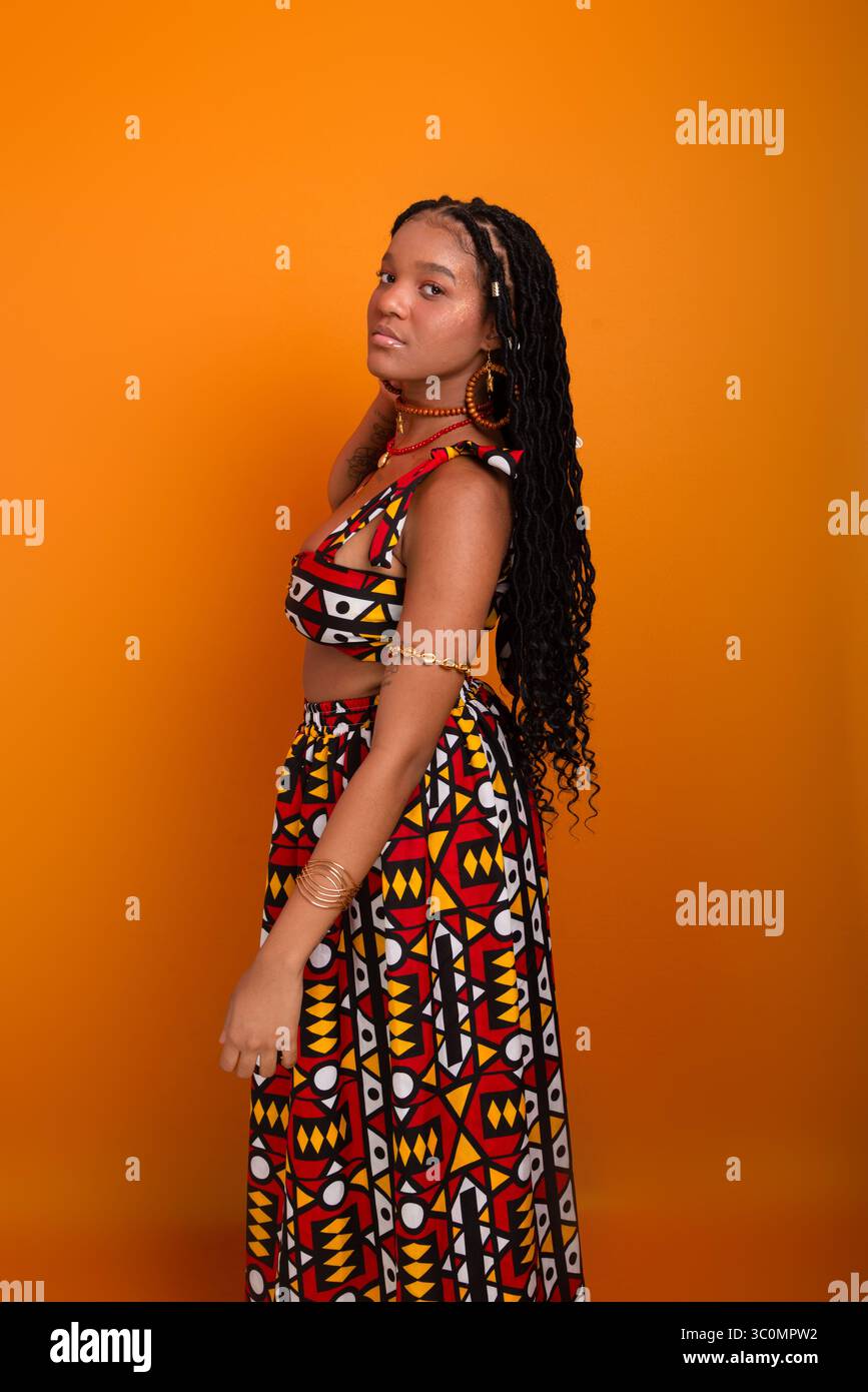 Tall young black woman standing hi-res stock photography and