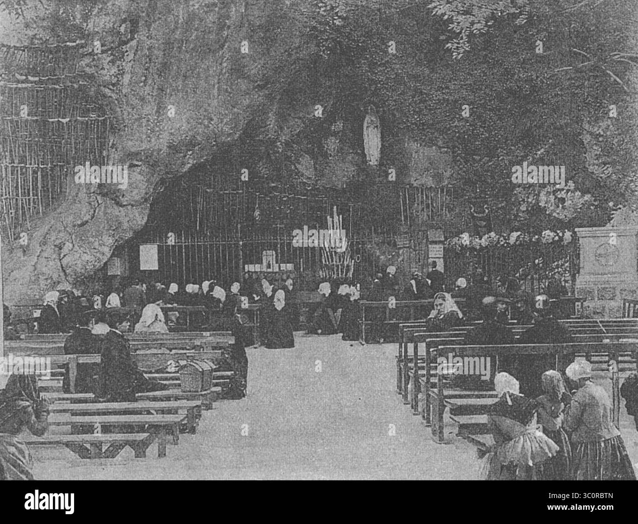 Massabielle grotto in Lourdes. Stock Photo