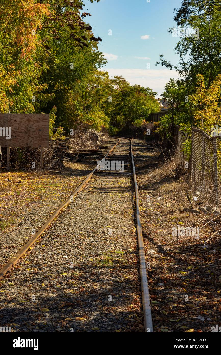Looking down an old abandoned rail road line Stock Photo