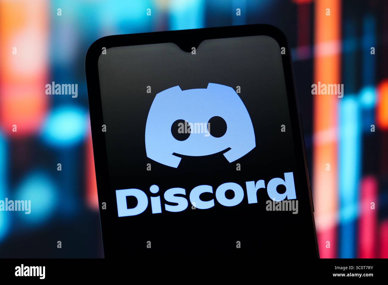 In this photo illustration, the Discord logo is seen displayed on a ...