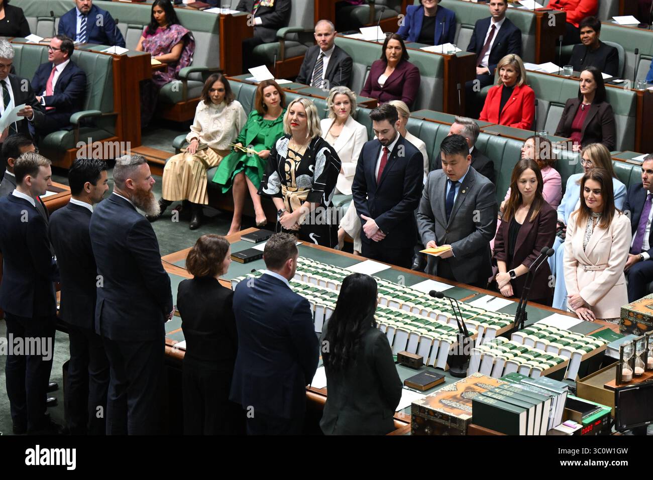Labor member for Dickson Ali France (right) takes the oath or ...